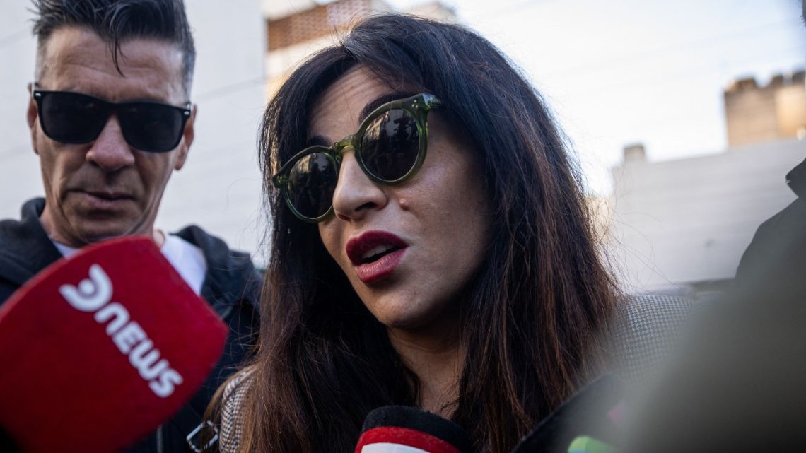 Gianinna Maradona, daughter of football legend Diego Maradona, speaks with the press on arrival in court for a trial hearing on her father's death in San Isidro, on the outskirts of Buenos Aires, on May 13, 2025. 