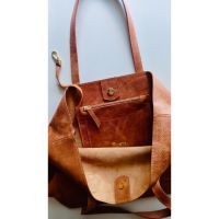 Quinta: Carteras de cuero artesanales con estilo y durabilidad