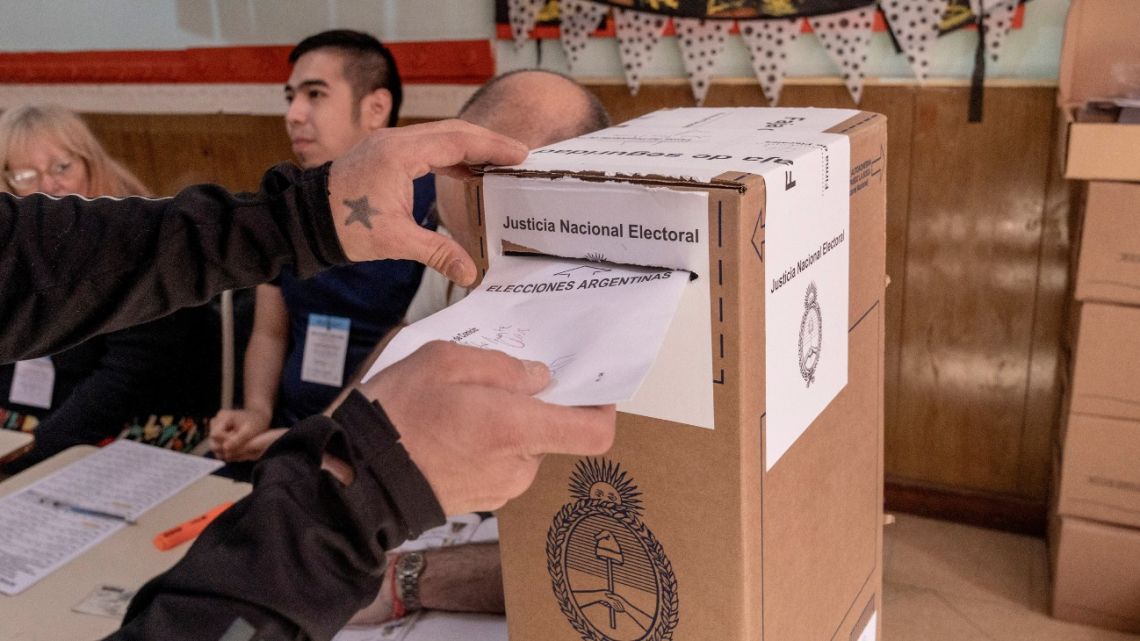 A voter casts a ballot at a polling station in Buenos Aires, Argentina, on Sunday, November 19, 2023.