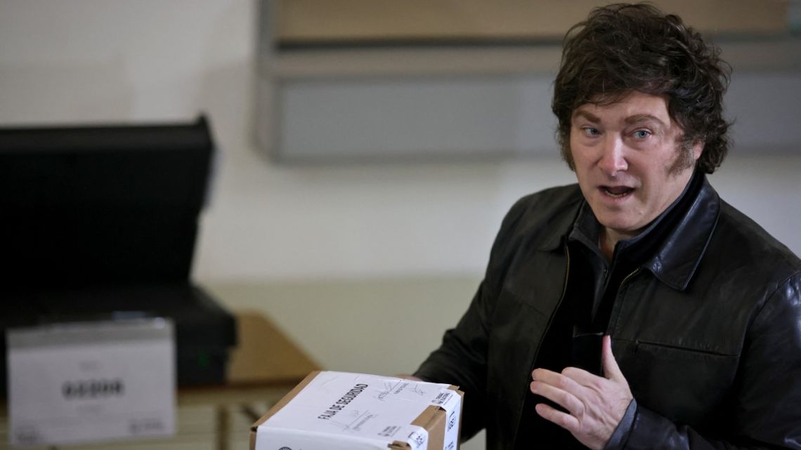 Argentina's President Javier Milei casts his vote at a polling station during the legislative elections in the city of Buenos Aires on May 18, 2025. 