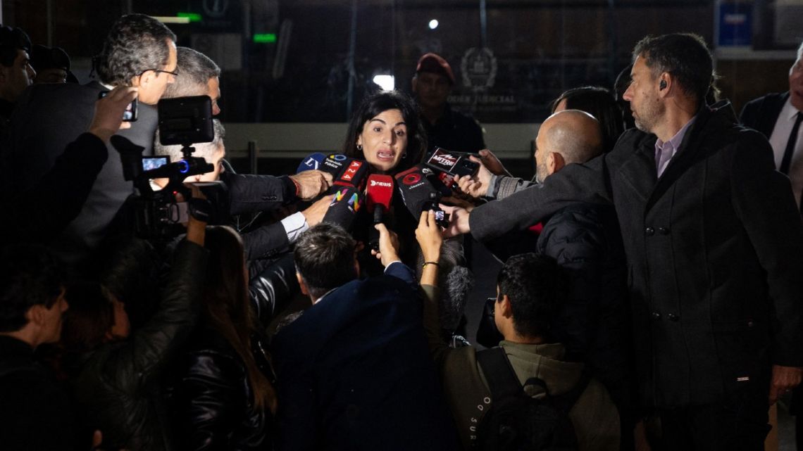 Gianinna Maradona, daughter of late football legend Diego Maradona, speaks to the media while leaving court after a trial hearing on her father's death in San Isidro, outskirts of Buenos Aires on May 13, 2025.