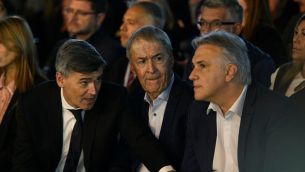 Daniel Passerini junto a Llaryora y Schiaretti