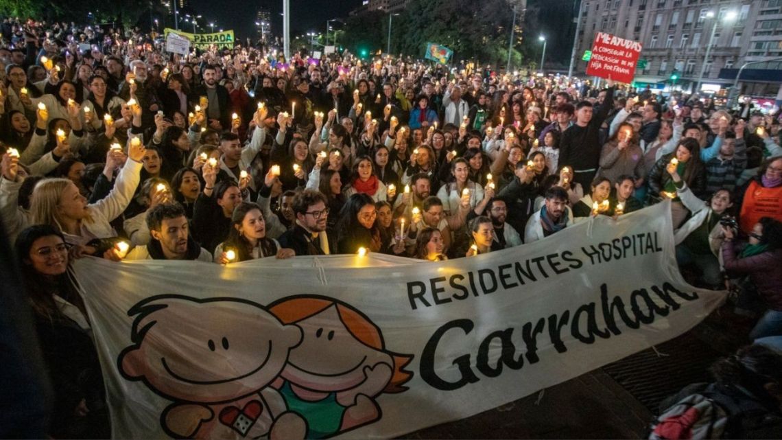 Doctors and staff at the Garrahan Children’s Hospital stage a candlelit march at the Obelisk in central Buenos Aires.