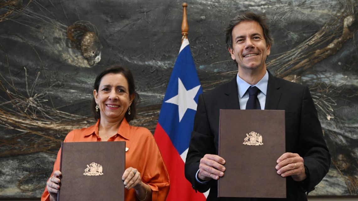 Desarrollo País' Board of Directors President Luz Granier and Google's Director of Telecommunications Infrastructure Latin America Cristian Ramos pose for a picture after the signing of the agreement for the implementation of the first submarine fiber optic cable between South America and Asia-Pacific in Santiago on June 4, 2025. 