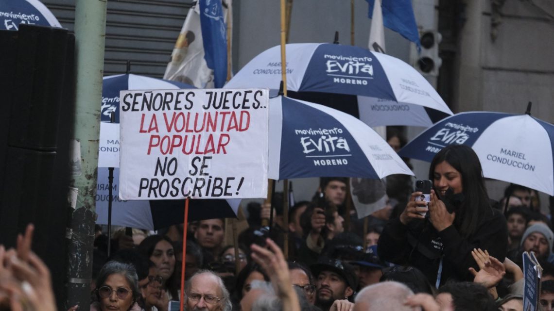 Supporters of former president Cristina Fernández de Kirchner’s wait outside the Partido Justicialista headquarters in Buenos Aires on June 10, 2025. 