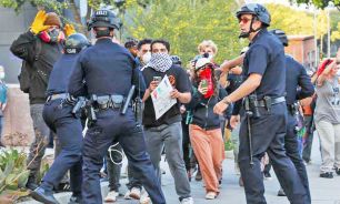 14_06_2025_violencia_manifestante_antiinmigrantes_afp_g