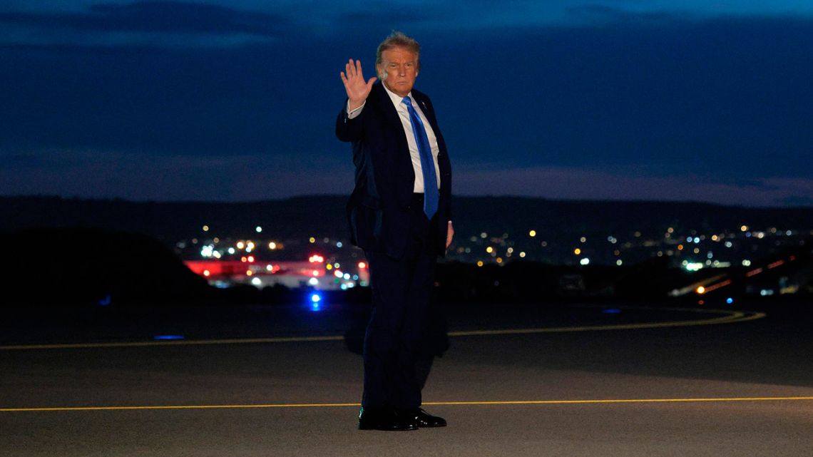 US President Donald Trump waves after leaving the G7 Leaders’ Summit early on June 16.