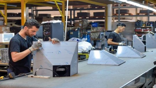 Workers at a factory in Buenos Aires Province.
