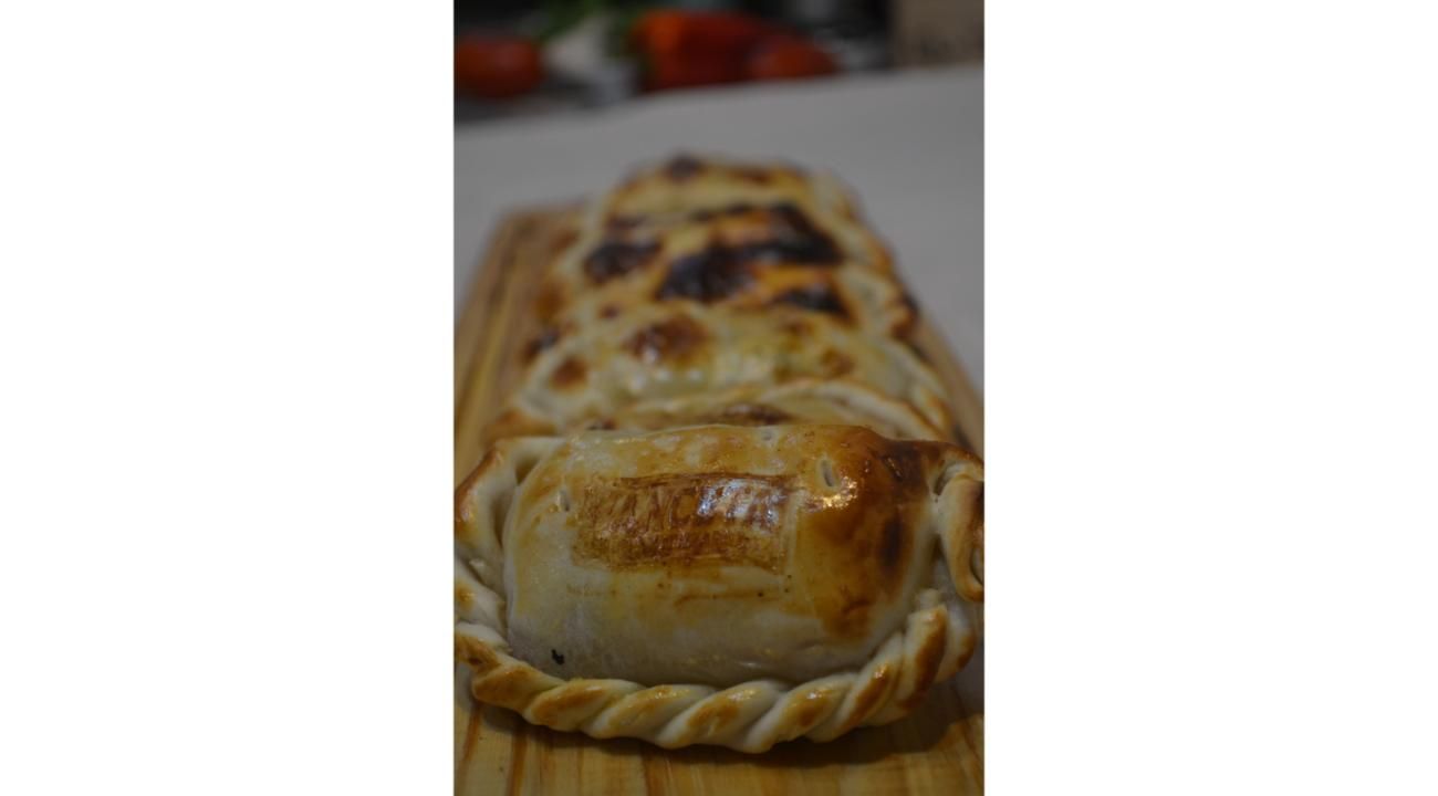 Empanadas al horno al disco: la pasión de Juan hecha sabor en El Rincón.