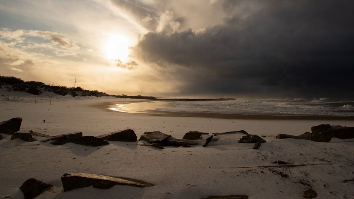A snow-covered beach is pictured in Miramar, Buenos Aires Province, Argentina, on June 30, 2025. 