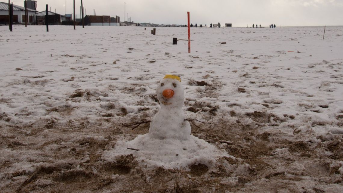 A snowman is pictured on a snow-covered beach in Miramar, Buenos Aires Province, Argentina, on June 30, 2025.