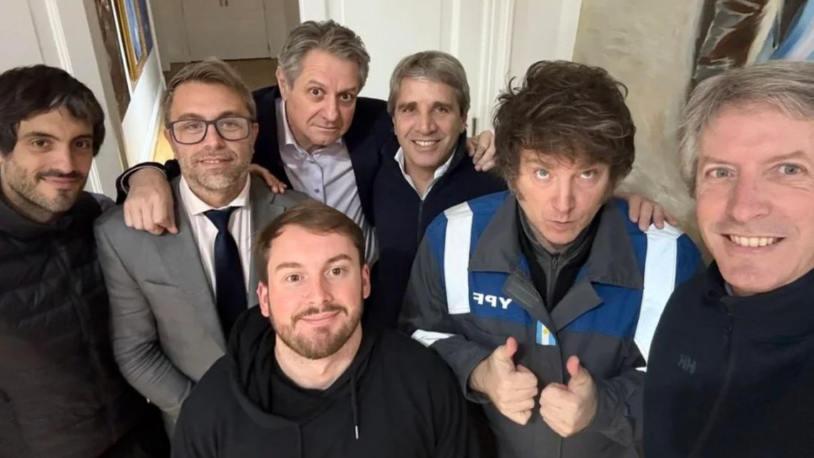 President Javier Milei poses for a photograph with his economic team.