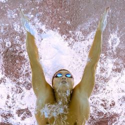 El nadador japonés Taku Taniguchi compite en una semifinal de los 50 m braza masculinos durante el Campeonato Mundial de Natación de 2025 en Singapur. | Foto:MANAN VATSYAYANA / AFP