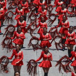 Porristas participan en un desfile durante la inauguración de la temporada vacacional de las Fiestas Agostinas, en el departamento de San Salvador, El Salvador. | Foto:Xinhua/Alexander Peña