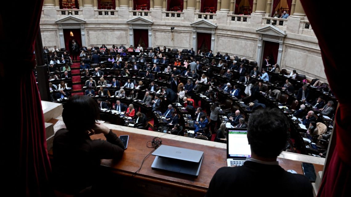 Deputies attend a session at the National Congress in Buenos Aires on August 20, 2025, to debate President Javier Milei's veto of bills to raise pensions and declare a disability emergency.