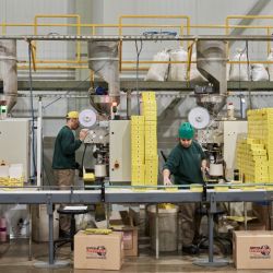 Workers at a Playadito yerba mate packaging plant in Colonia Liebig.  