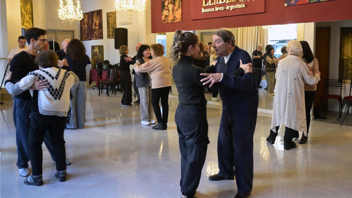 People suffering from Parkinson's disease dance during a tango therapy session in Buenos Aires on August 26, 2025.