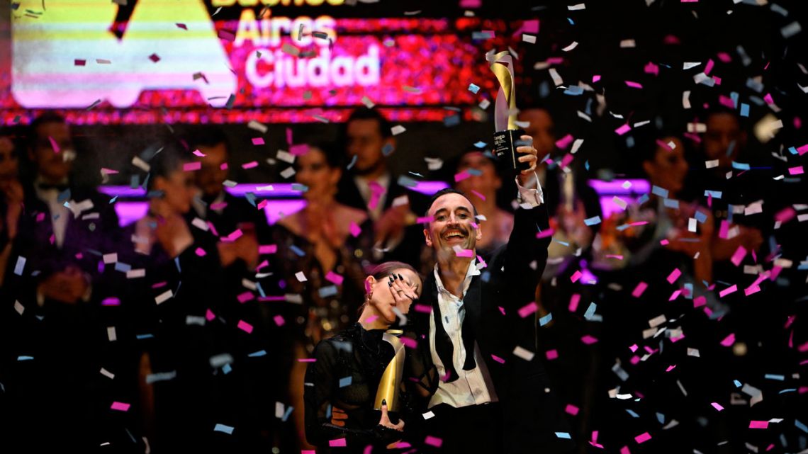 Argentine duo Micaela García and Leandro Bojko celebrate after winning the Stage Tango Style category during the World Tango Championship Final in Buenos Aires on September 2, 2025. 