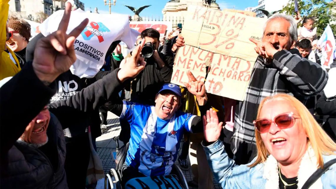 Disabled rights campaigners, relatives and supporters celebrate the Senate's rejection of Milei's veto.