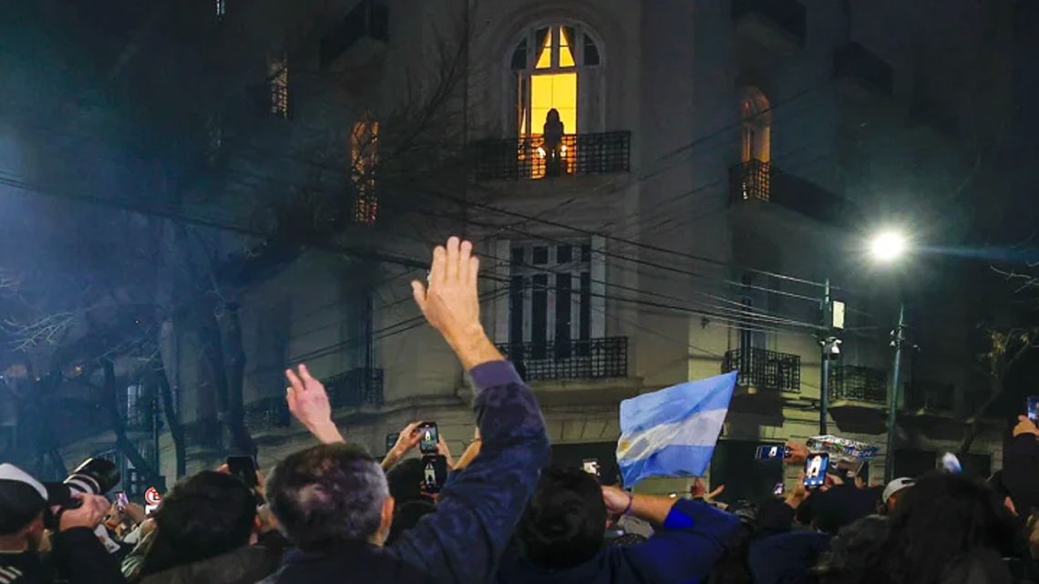 Cristina Fernández de Kirchner appears on a balcony at her residence in Buenos Aires.