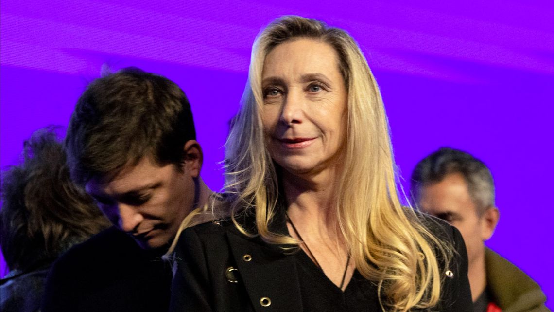 Karina Milei, with Santiago Caputo behind her.