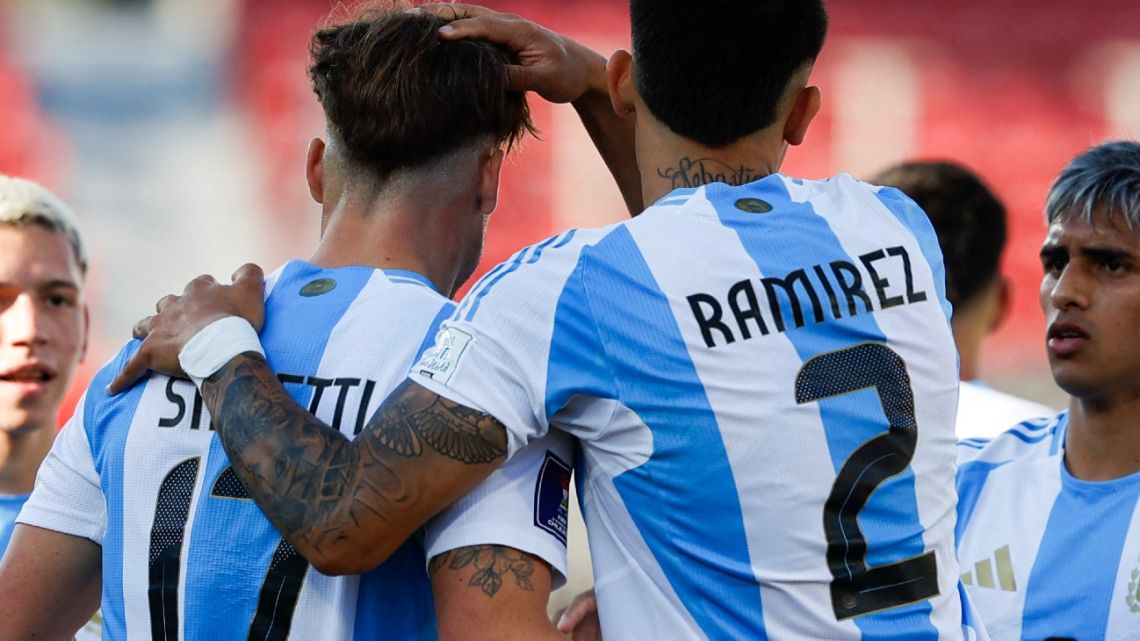 Argentina's forward #17 Mateo Silvetti celebrates scoring his team's fourth goal during the 2025 FIFA U-20 World Cup round of 16 football match between Argentina and Nigeria at the National Stadium in Santiago on October 8, 2025.