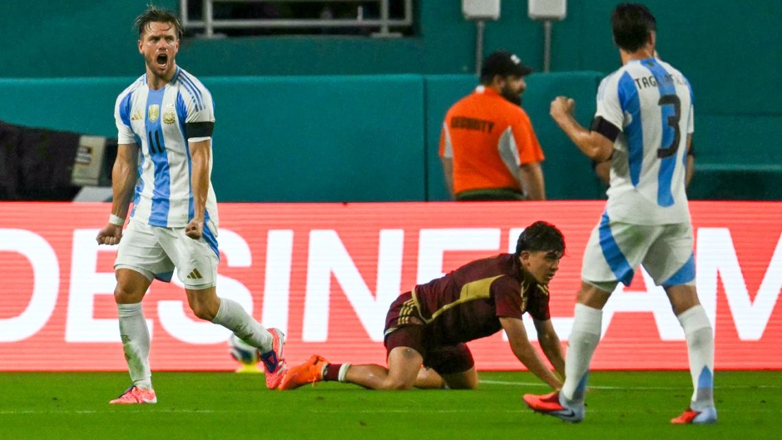 Argentina's midfielder Giovani Lo Celso celebrates after scoring a goal during a friendly match between Argentina and Venezuela at the Hard Rock Stadium in Miami Gardens, Florida, on October 10, 2025. 