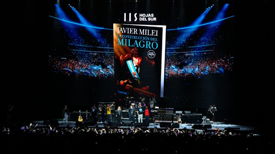 Argentina's President Javier Milei performs on stage during the launch of his new book at the Movistar Arena in Buenos Aires on October 6, 2025. 