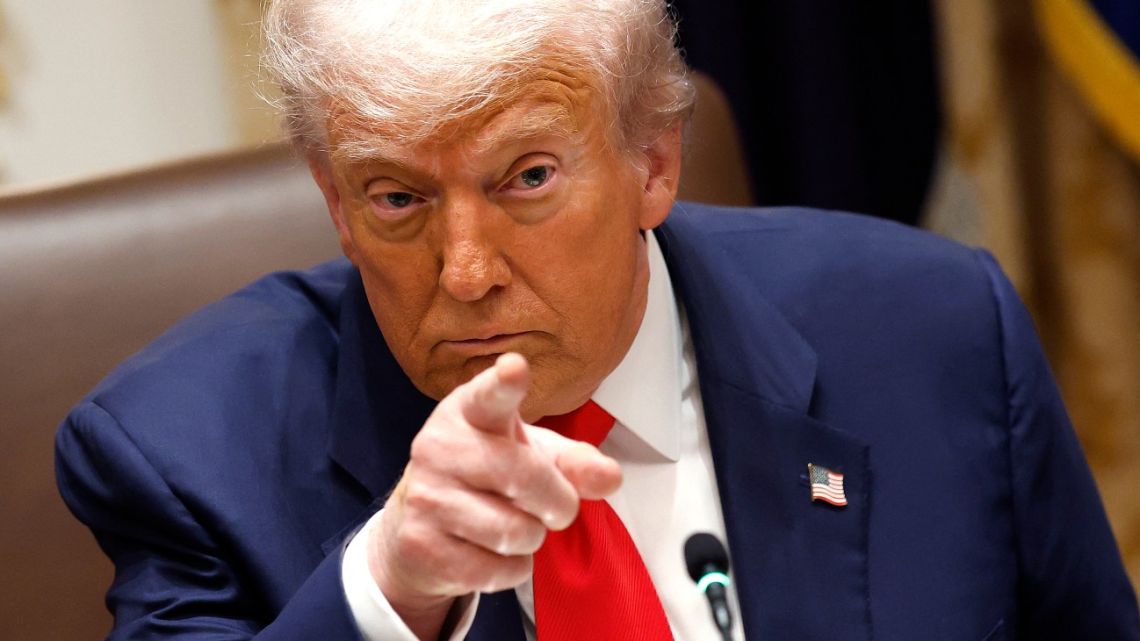 US President Donald Trump speaks during a meeting with President of Argentina Javier Milei in the Cabinet Room at the White House on October 14, 2025 in Washington, DC.