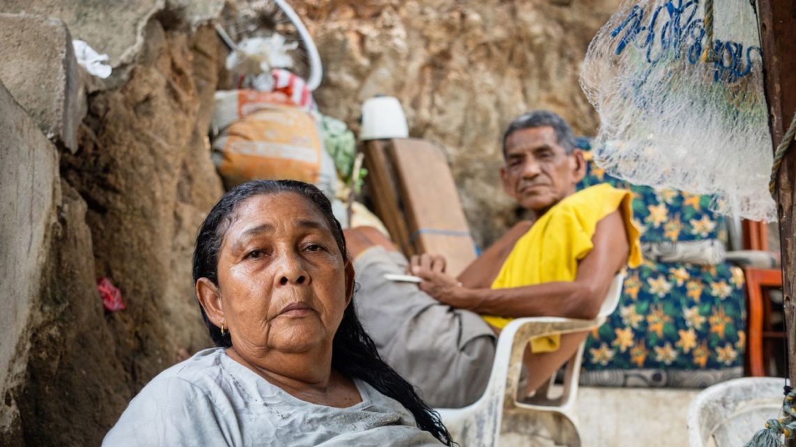 Carmela Medina and Alejandro Carranza, pose for a photo at their house in Santa Marta on October 21, 2025. Their son, Alejandro Carranza was a Colombian man who allegedly died when the US bombed a boat supposedly carrying drugs in the Caribbean.