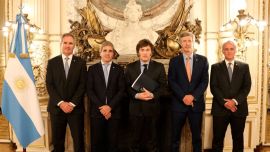 Officials with Milei.