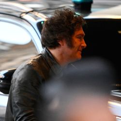 President Javier Milei arrives at the ruling party's La Libertad Avanza headquarters during the national midterm legislative election, in Buenos Aires on October 26, 2025.