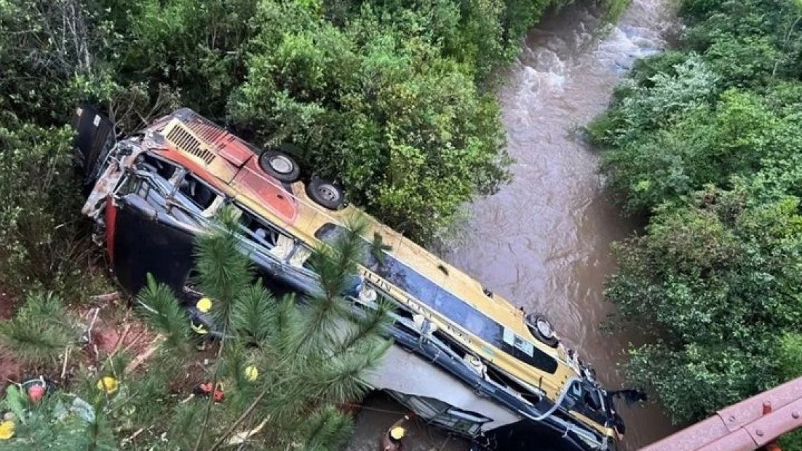 The long-haul bus, operated by the Sol del Norte firm, plunged into the Yazá stream from a bridge after colliding with a Ford Focus car in Misiones Province, which borders Brazil and Paraguay, regional officials confirmed. 