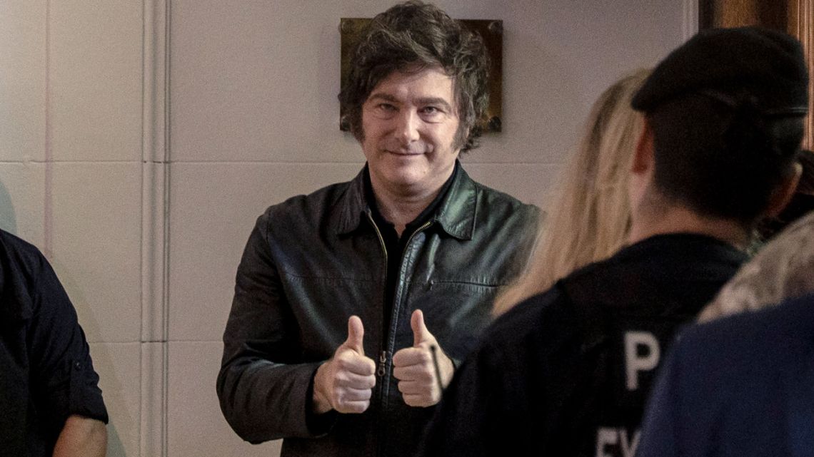 Javier Milei, Argentina's president, arrives to cast a ballot at a polling station during the midterm elections in Buenos Aires, Argentina, on Sunday, October 26, 2025. 