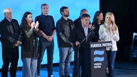 Buenos Aires Province Governor Axel Kicillof speaks to supporters next to Vice-Governor Verónica Magario and elected legislators after the midterm legislative election at the Fuerza Patria headquarters in La Plata, Buenos Aires Province, on October 26, 2025.