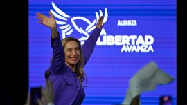 Presidential Chief-of-Staff Karina Milei waves to supporters as she celebrates at the ruling party's La Libertad Avanza headquarters following the results of the national midterm legislative election in Buenos Aires on October 26, 2025.