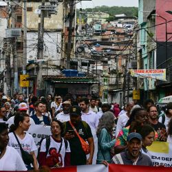 Activistas y residentes participan en una protesta en el Complejo de Penha en Río de Janeiro, Brasil. Foto de Pablo PORCIUNCULA / AFP | Foto:AFP
