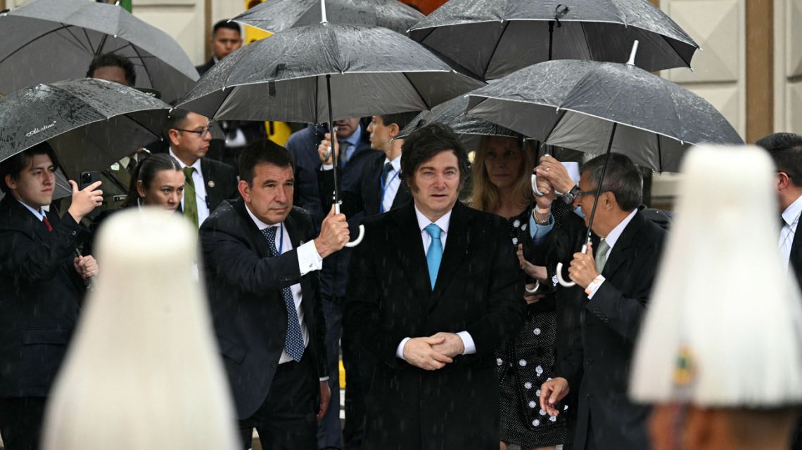 Argentina's President Javier Milei arrives at the Murillo Square for the inauguration ceremony of Bolivia's president-elect Rodrigo Paz in La Paz on November 8, 2025. 