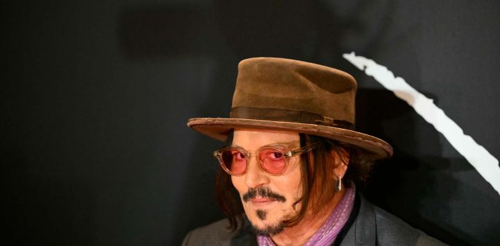 Johnny Depp llega a la alfombra roja para la avant-première de su nueva película 'Modi, Tres Días en el Ala de la Locura' en Argentina. Foto de Luis Robayo / AFP