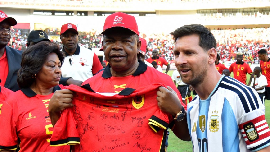 Lionel Messi poses next to Angola's President João Lourenco before the friendly match between Angola and Argentina in Luanda on November 14, 2025.
