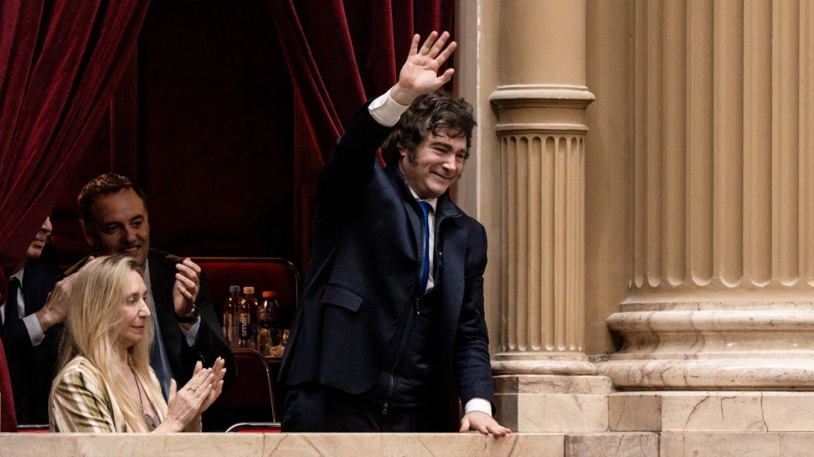 Javier Milei, Argentina's president, waves during a swearing in ceremony at the National Congress in Buenos Aires.
