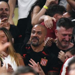 Estudiantes de la Plata club president and former player Juan Sebastián Verón celebrates among fans after the team won the penalty shoot-out of the Argentine Professional Football League 2025 Clausura Tournament final match between Racing and Estudiantes at the Madre de Ciudades stadium in Santiago del Estero, Argentina on December 13, 2025. 