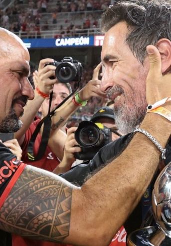 Juan Sebastián Verón y Eduardo Domínguez