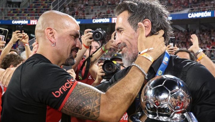 Juan Sebastián Verón y Eduardo Domínguez