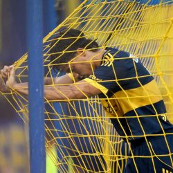 El delantero de Boca Juniors, Exequiel Zeballos, reacciona durante el partido amistoso de fútbol entre Boca Juniors de Argentina y Millonarios de Colombia en homenaje al fallecido entrenador argentino Miguel Angel Russo en el estadio La Bombonera de Buenos Aires. | Foto:LUIS ROBAYO / AFP