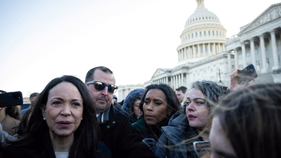 Venezuelan opposition leader Maria Corina Machado is surrounded by press as she departs the US Capitol after meeting with US senators on January 15, 2026 in Washington, DC.