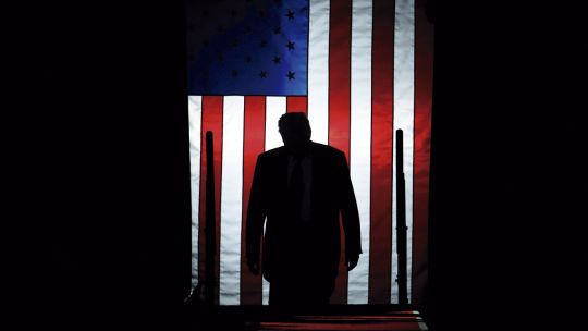US President Donald Trump, photographed against the US flag ARTY STOCK