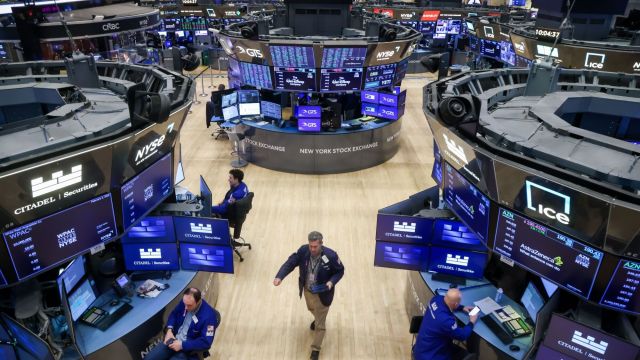 Traders work on the floor the New York Stock Exchange