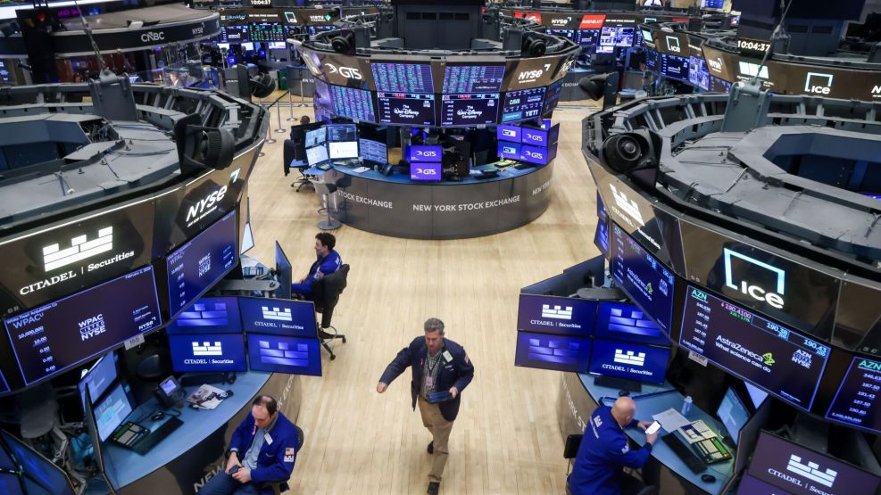 Traders work on the floor the New York Stock Exchange