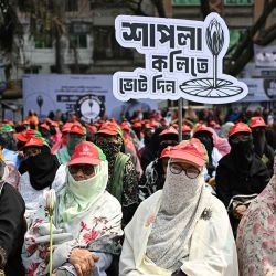 Simpatizantes de la alianza liderada por el partido Jamaat-e-Islami asisten a un mitin antes de las elecciones generales de Bangladés en Daca. Foto de Sajjad HUSSAIN / AFP | Foto:AFP